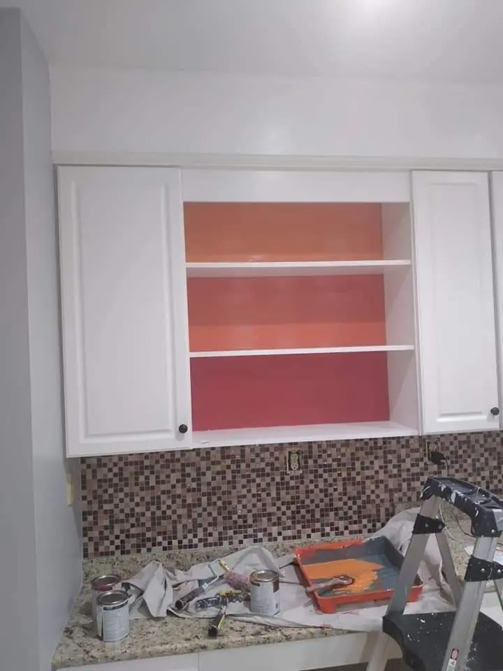 three row cabinet with fresh paint