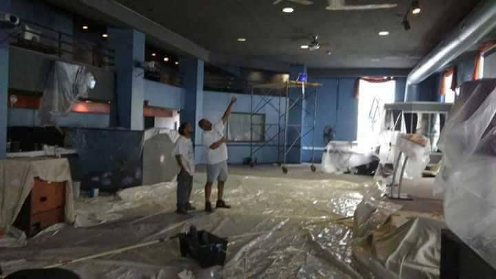 commercial building being painted